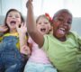 kids laughing while sitting down 90x80