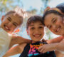 three girls smiling 90x80
